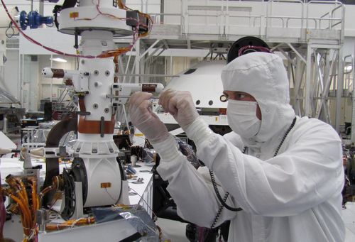 Sensors on two finger-like mini-booms extending horizontally from the mast of NASA