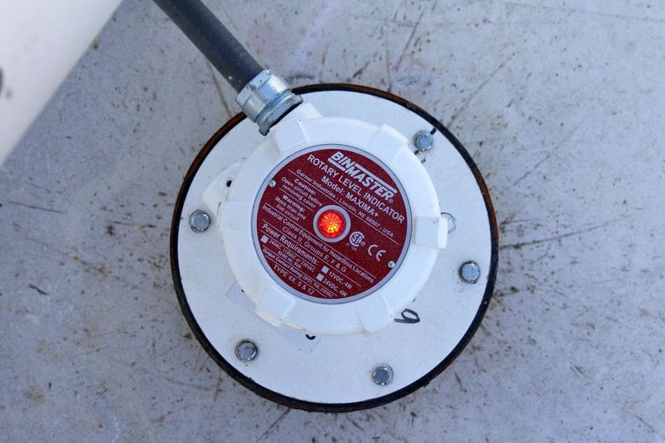Sensors alert to full status to prevent overfilling silos.