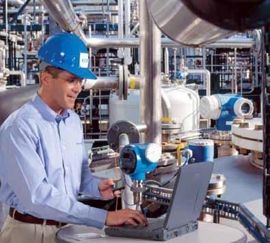 A technician manages a flowmeter’s calibration data via a software system, such as Endress+Hauser’s CompuCal calibration management system.