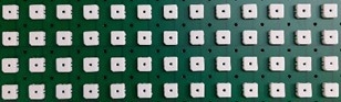 Test board with array of cooperative sensors.