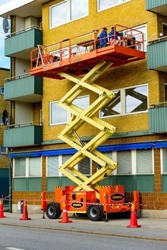 Rough Terrain (engine-powered) scissor lift.