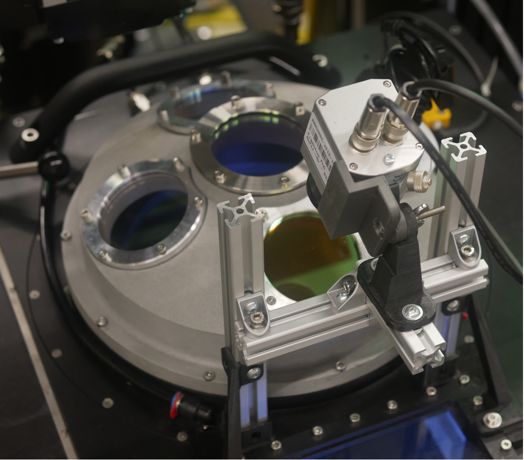 A zinc selenide window gives the infrared camera a view of the process