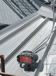 SmartBob in action, installed on a bin roof for level measurement.