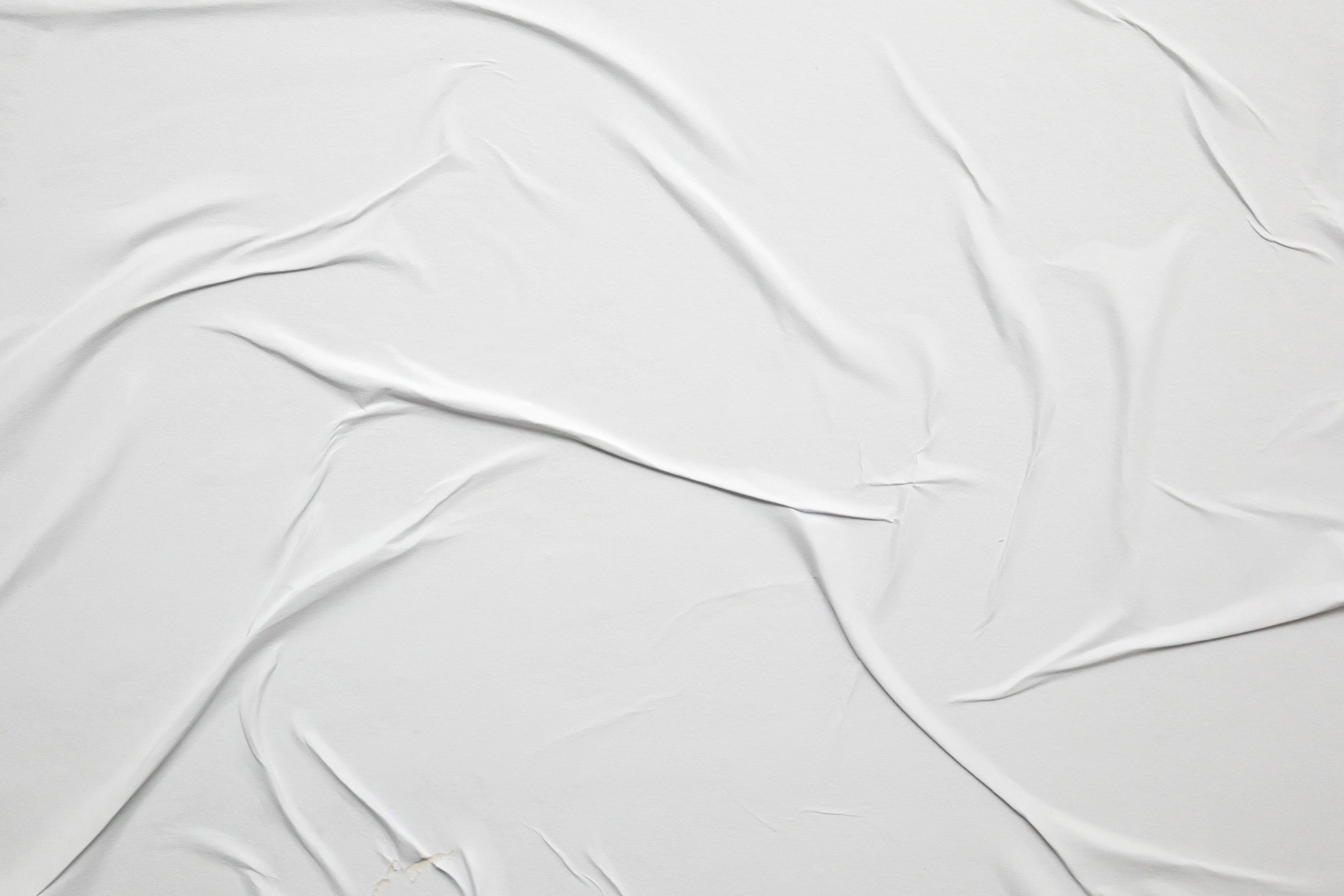 white, wrinkled background as a representation of surface wrinkles.
