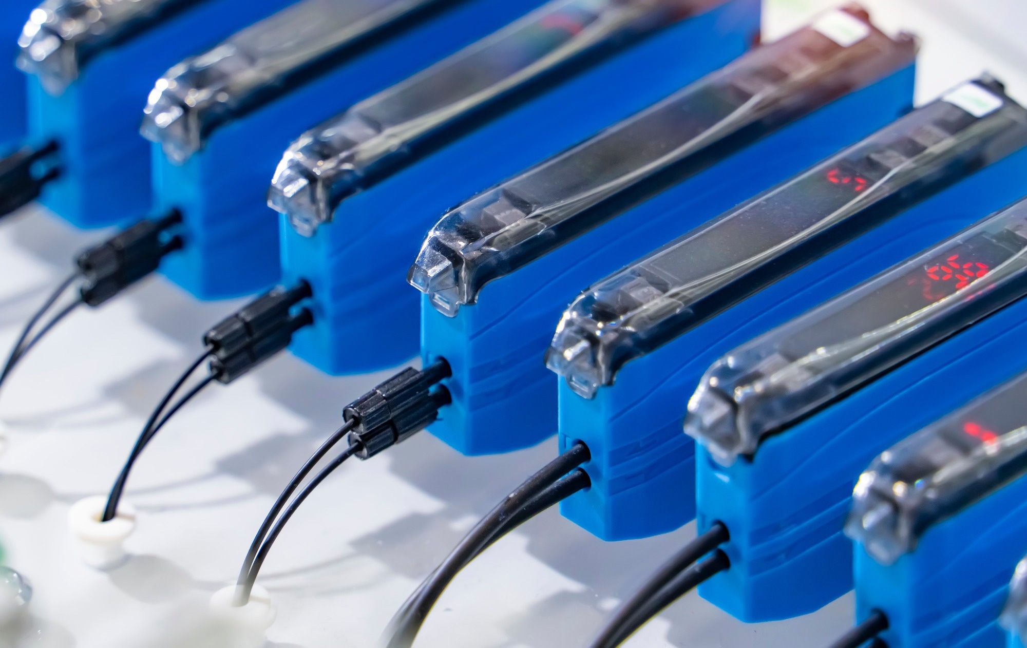 transducer on industrial machine robot in assembly line working in factory. Smart factory industry 4.0 concept.