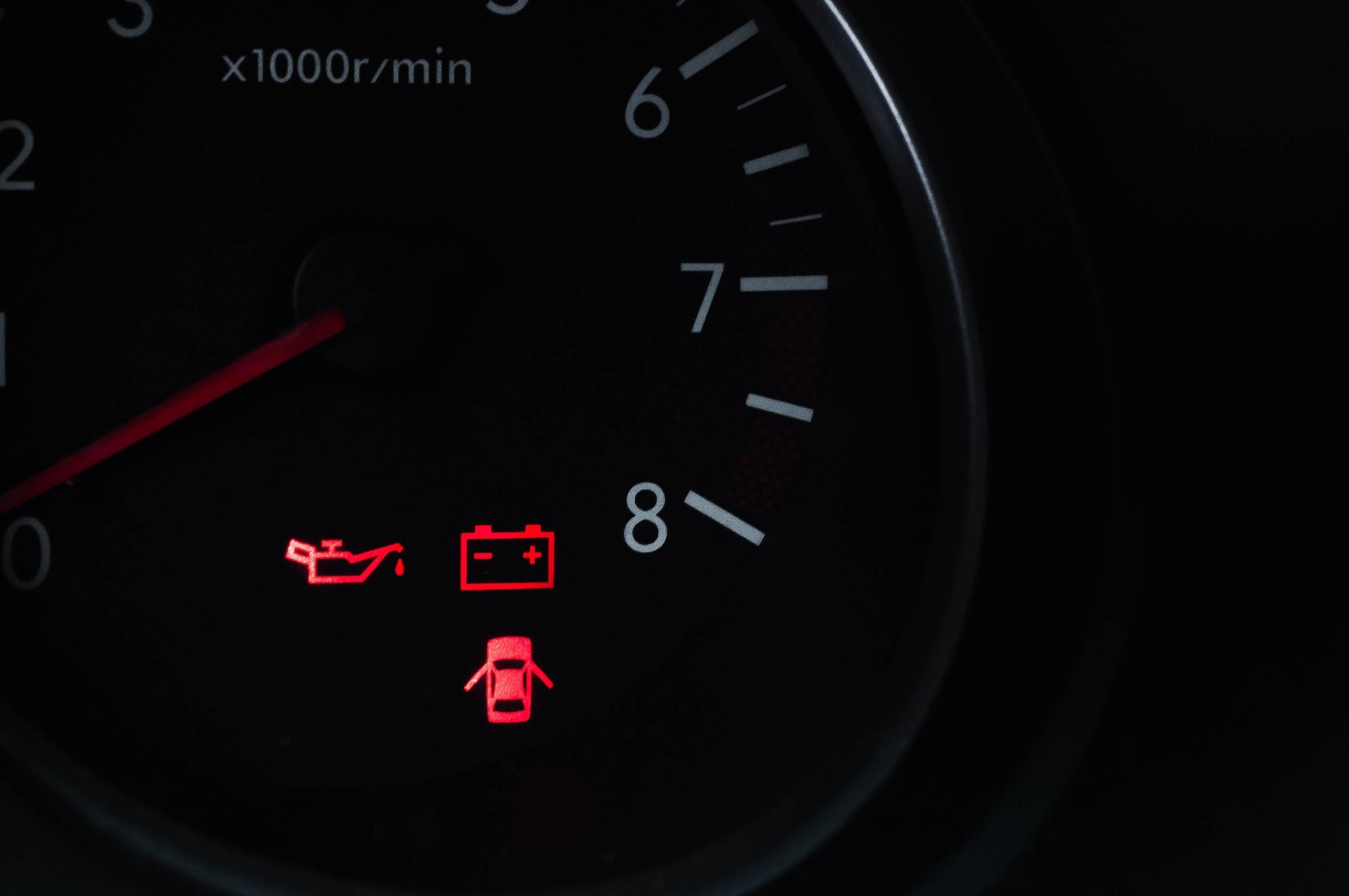 Sensors on the dashboard of the car, signaling about the health of all systems before starting. Battery discharge, oil pressure, unclosed doors.