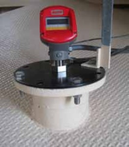 Scanner mounted on existing flange, using an adapter plate.