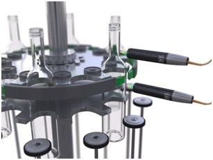 Inspection of wall thickness and roundness of the bottles during glass production.