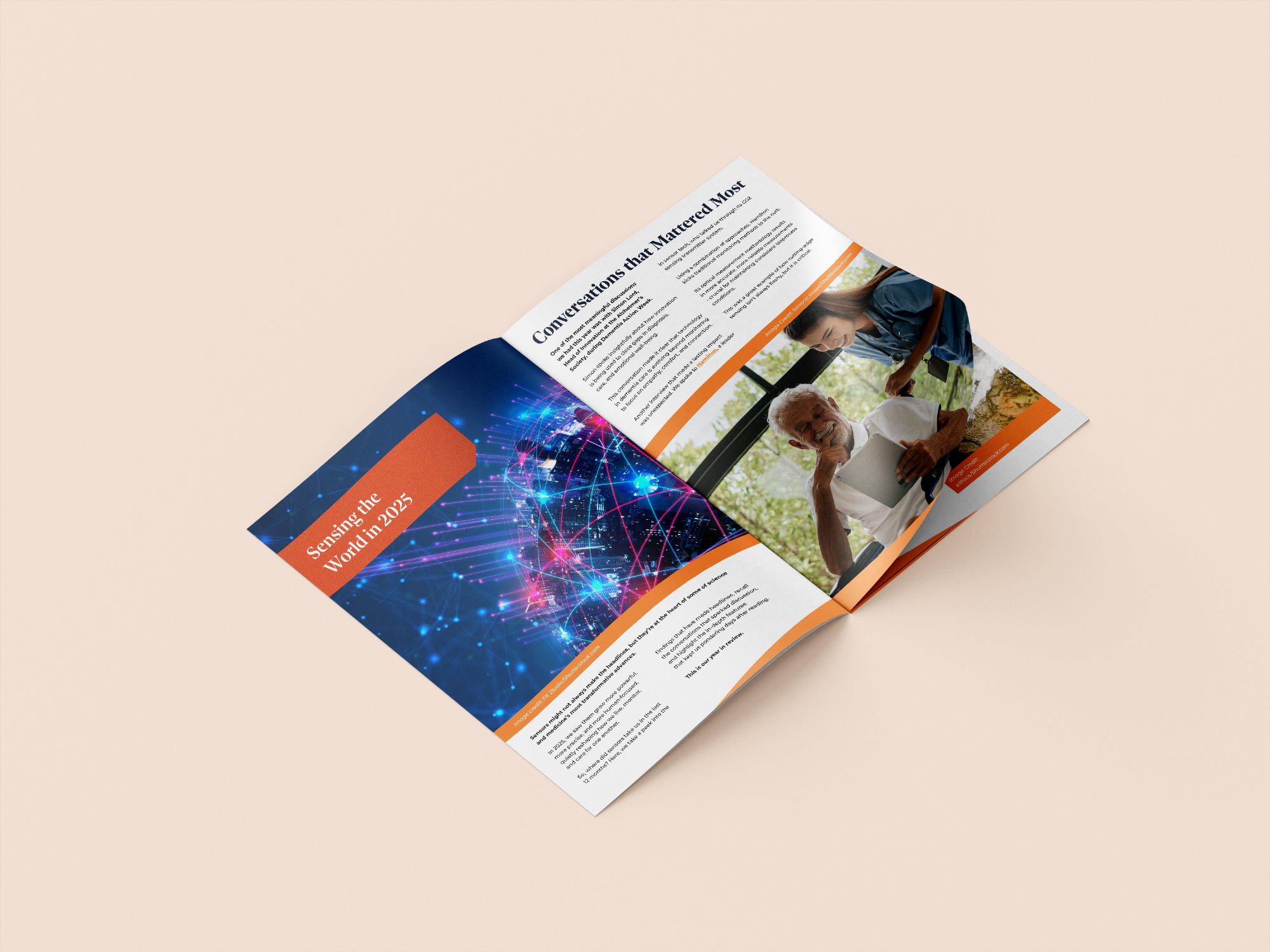 A flat lay of a magazine with the words "Sensing the World in 2025" in the top left corner, with a picture of a lit up world with light coming off buildings into space, and another picture of an older man looking at an iPad while a younger women smiles and looks over his shoulder.