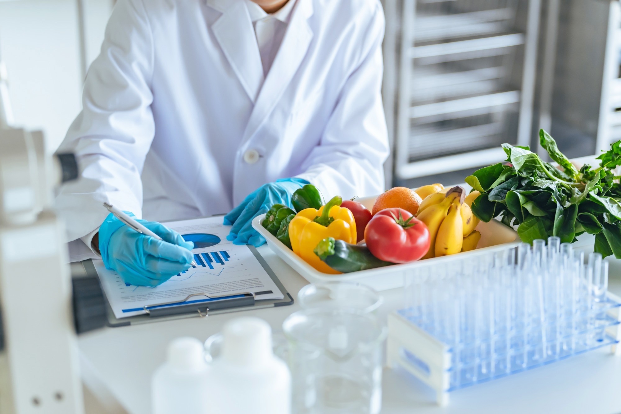 Researchers inspecting vegetables and fruits.