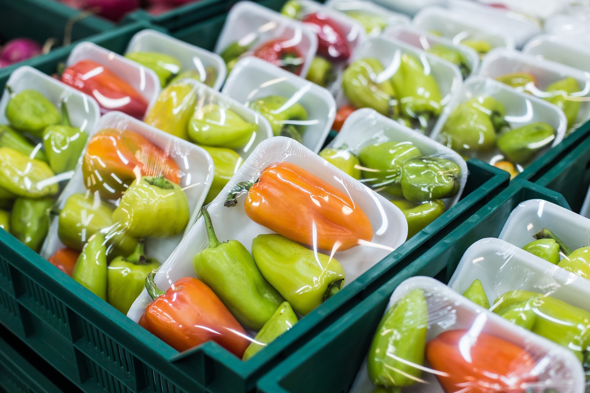 Bulgarian pepper in a box on a shelf in a supermarket