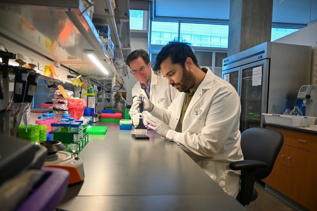 Jared Fischer, Ph.D., left, and Jose Luis Montoya Mira, Ph.D., cancer researchers at OHSU, have developed PAC-MANN, a test that uses a small blood sample to detect changes in protease activity, a key indicator of the most common and deadliest form of pancreatic cancer.