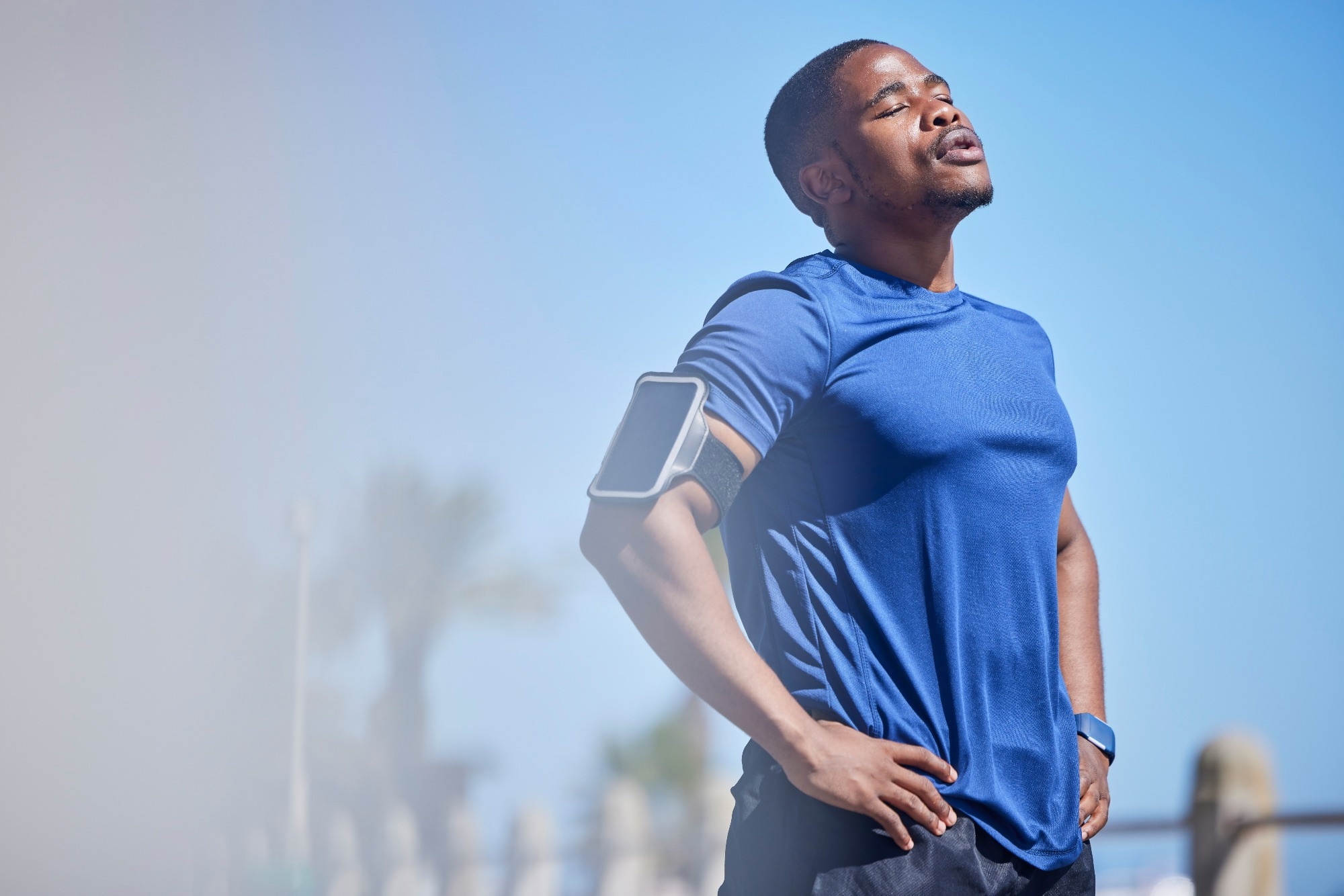 Man breathing after exercising.