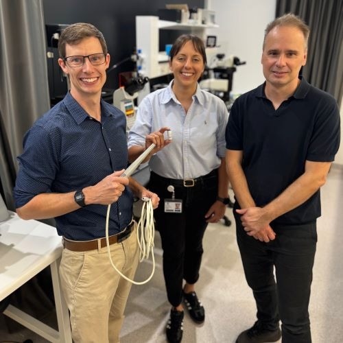 Photo of Dr. Aidan Cousins, Dr. Nicole Dmochowska, and Professor Benjamin Thierry in their lab.