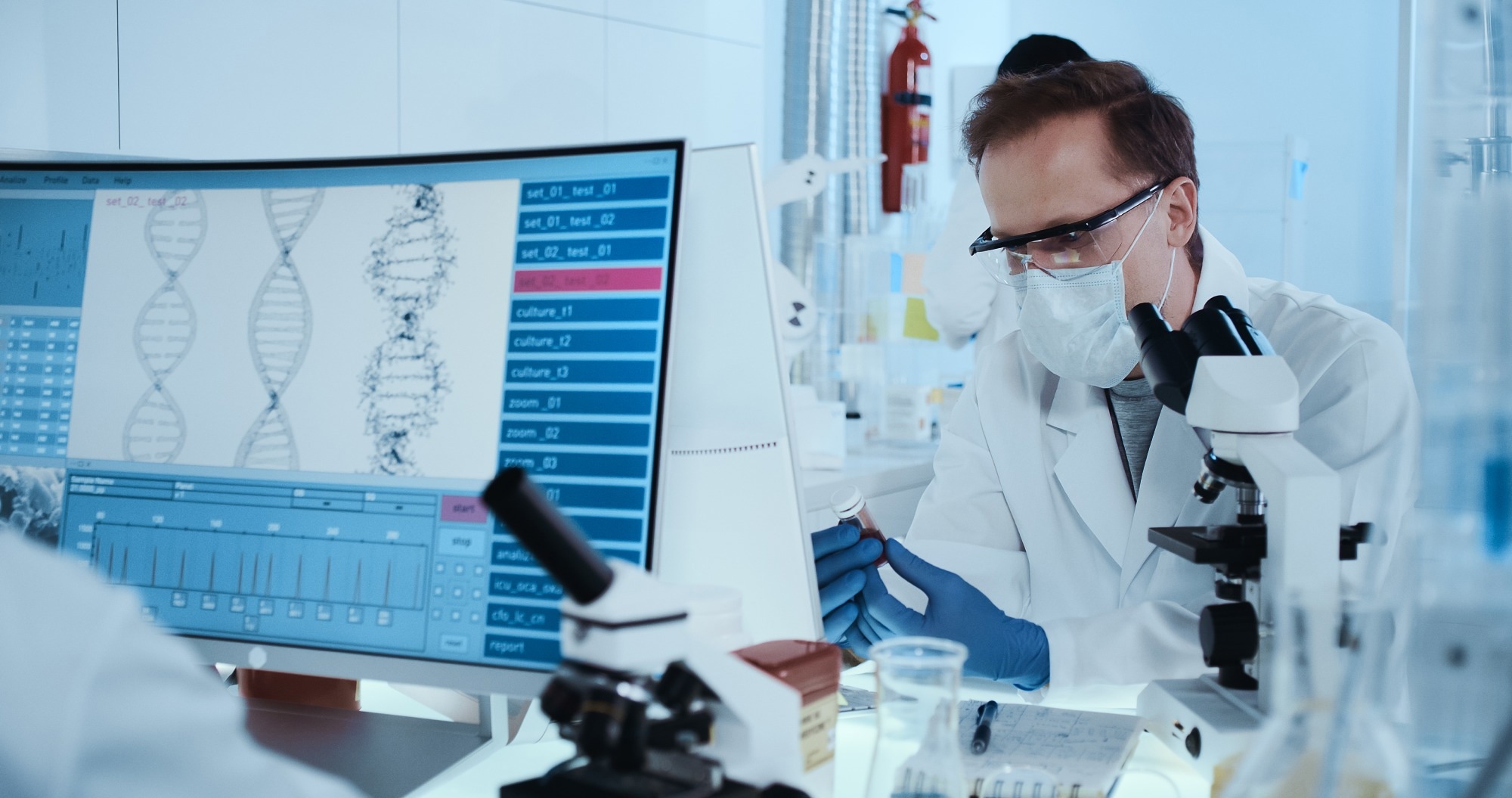 Scientist working with microscope in futuristic laboratory.