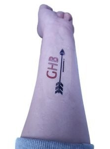 This tattoo-like sticker, which can be printed in a variety of designs, detects the presence of a drug often used to “spike” drinks — the letters turn red when exposed to it.