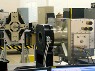 Automated Rendezvous and Docking System with Vision Navigation Sensor for Space Flight