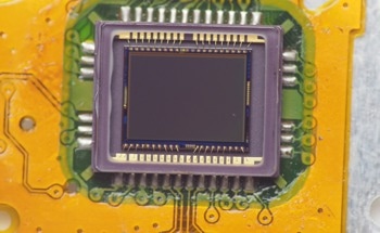 Integrating Photodetectors and Neuromorphic Vision Sensors Into a Single Device