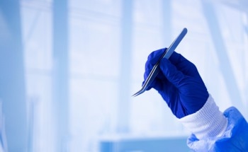 Miniature Magnetoelectric Antenna Safely Powers Deep-Tissue Implants